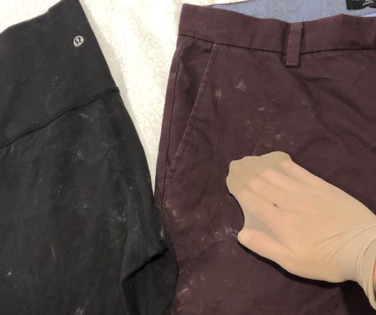 pants with soap residue. hand with nylon sock